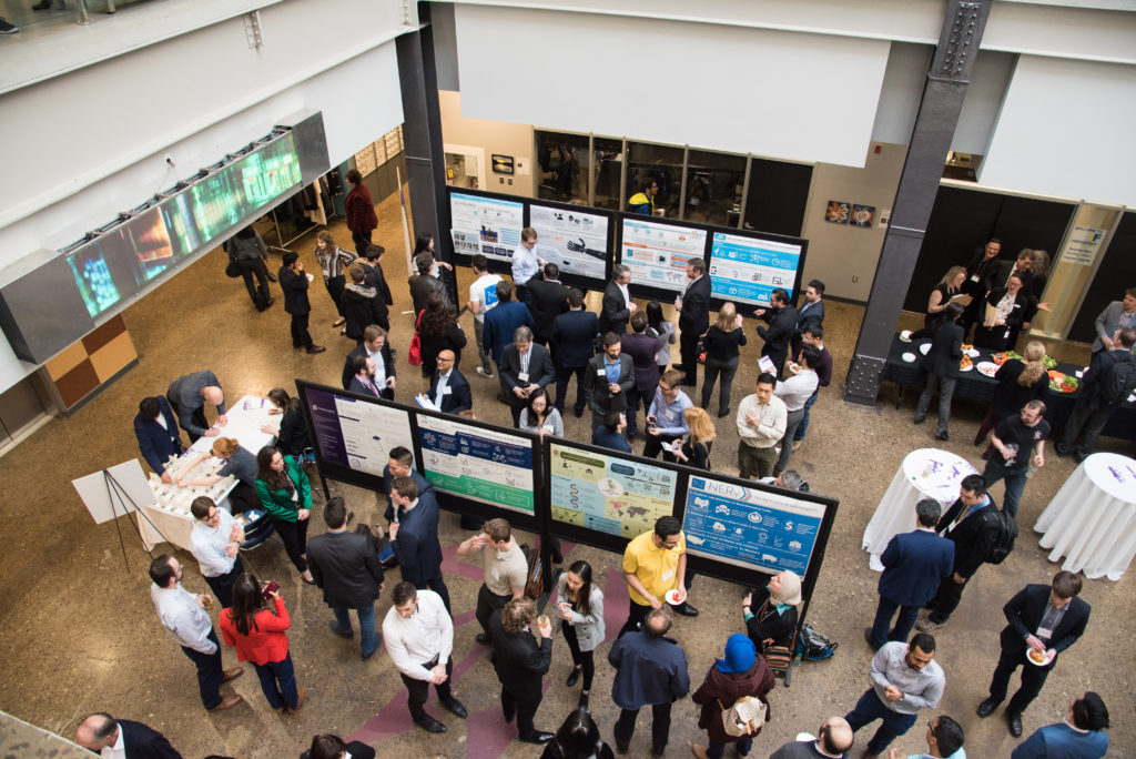 Individuals networking at the Synapse Life Science Pitch Competition