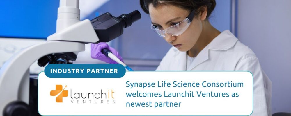 The collaboration highlights a joint commitment to advancing the life sciences ecosystem across Hamilton and Ontario. Background image is a woman researcher adding a blue liquid to a microscope slide using a dropper.